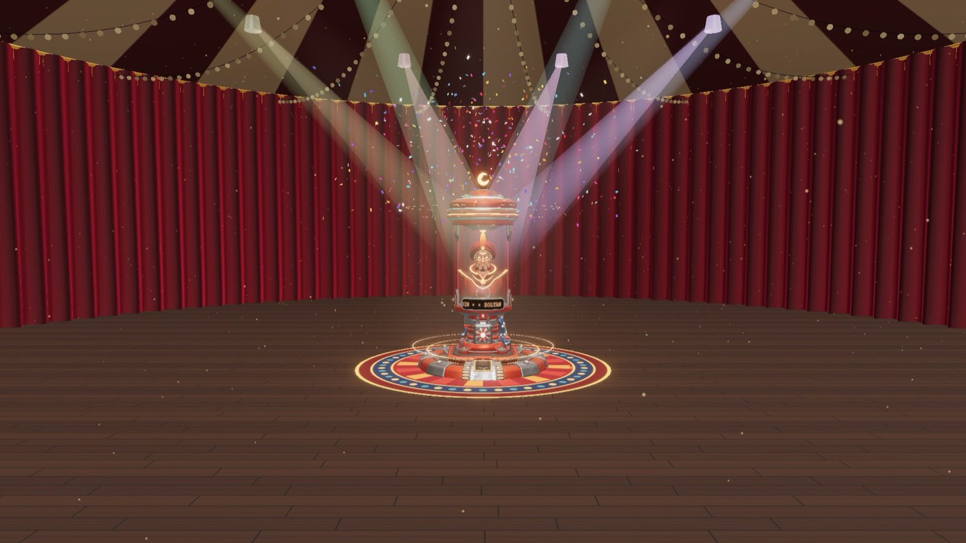 The machine on a dark stage under coloured spotlights, confetti in the air.